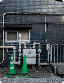 Building exterior with piping